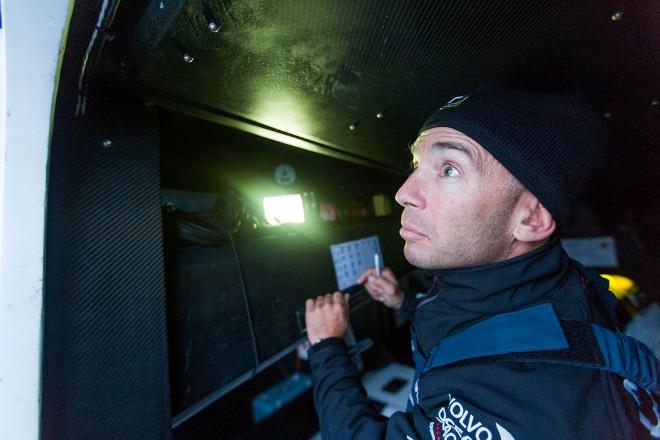 Onboard Team Vestas Wind – Maciel Cicchetti 'Cicho' calls the constant AIS watch to Nico - Leg 8 to Lorient – Volvo Ocean Race 2015 © Brian Carlin / Team Vestas Wind/Volvo Ocean Race